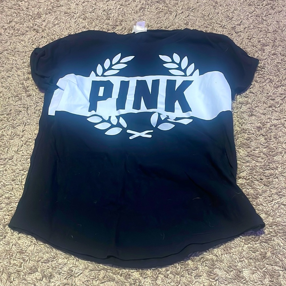 Black pink top fits a little small